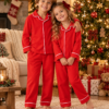 Children in Matching Christmas Pyjamas Raff & Roo The Christmas Club Pyjamas
